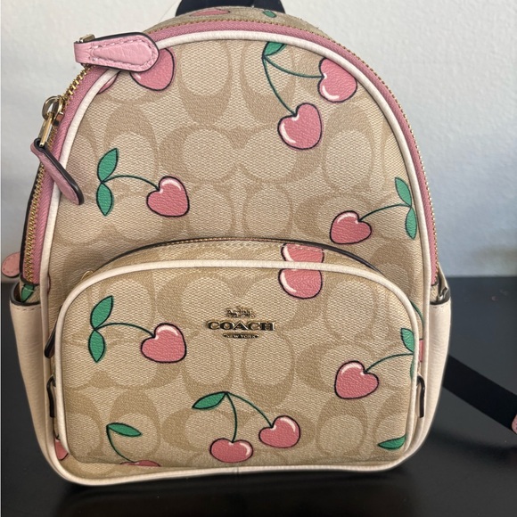 Coach Handbags - Coach Beige and Pink Cherry Backpack